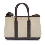 An Hermes Garden Party canvas and chocolate leather tote