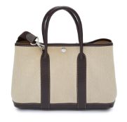 An Hermes Garden Party canvas and chocolate leather tote