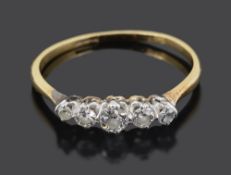 A delicate five stone graduated diamond set ring