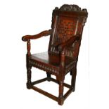 A 17th century carved oak Wainscot armchair