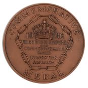 A bronze 1966 Kingston British Empire and Commonwealth Games participation medal,