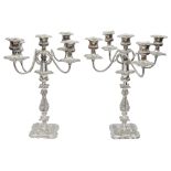 A pair of mid 20th silver plated five light candelabra in late Georgian style