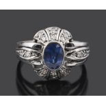 An attract Continental Art Deco sapphire and diamond pierced dress ring