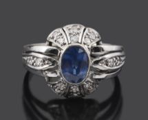 An attract Continental Art Deco sapphire and diamond pierced dress ring