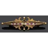 A 15ct gold ruby and diamond bar brooch