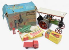 A small group of Dinky Toys and a Mamod Traction Engine,