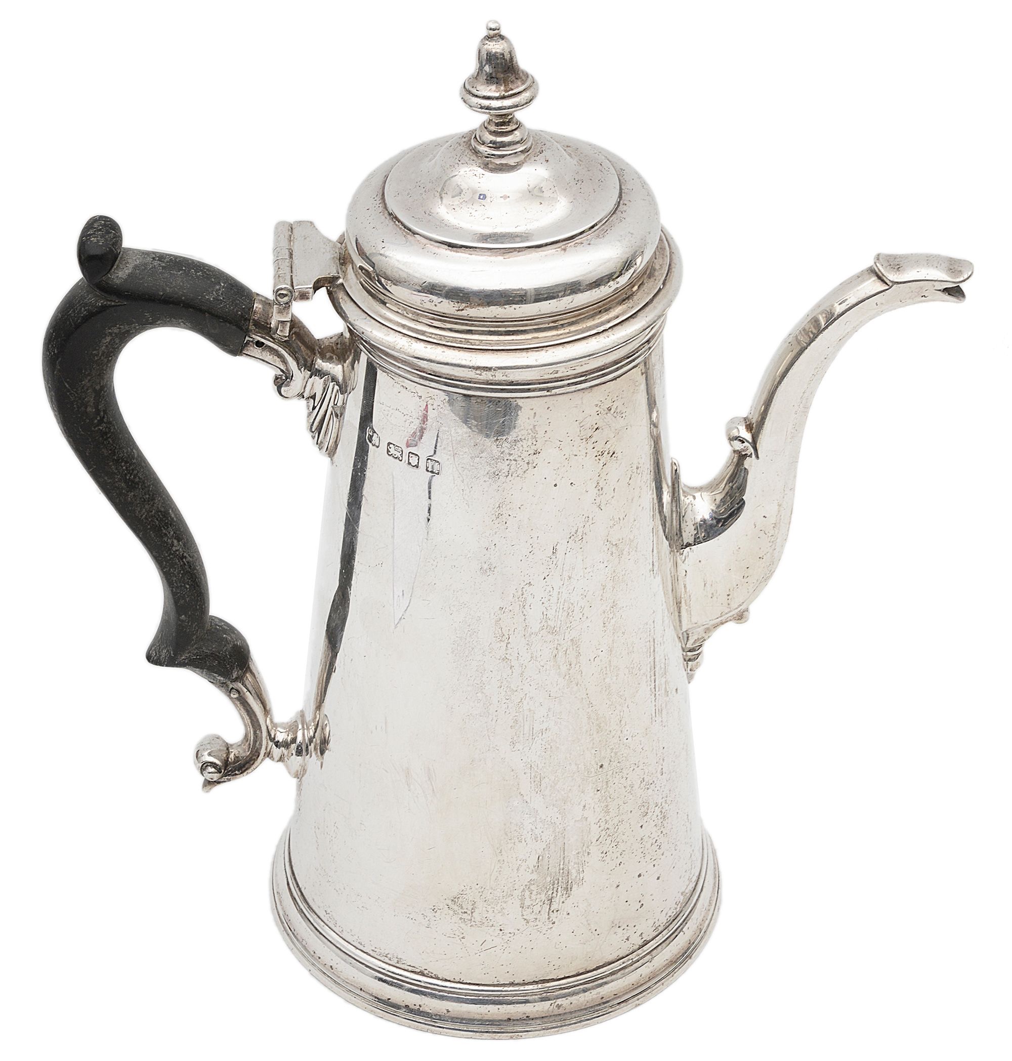 A George V silver coffee pot in George II style