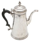 A George V silver coffee pot in George II style