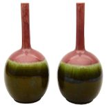 A pair of late 19th century Art Pottery bottle vases