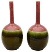 A pair of late 19th century Art Pottery bottle vases