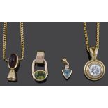 A collection of four Continental gem set modernist style pendants