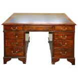 A large Victorian mahogany twin pedestal desk