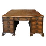 Gillow. An early 20th c. George II style walnut and burr walnut partners desk c.1900