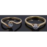 An 18ct gold single stone diamond ring and another ring,