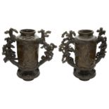 A pair of large Japanese Meiji period bronze twin handled censers
