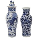 Two late 19th century Chinese blue and white slender baluster vases