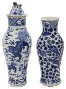 Two late 19th century Chinese blue and white slender baluster vases