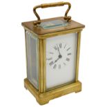 An early 20th century French gilt brass cased carriage clock
