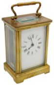 An early 20th century French gilt brass cased carriage clock