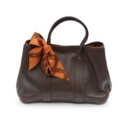 An Hermes Chocolate Veau Swift leather Garden Party bag