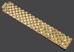 A Continental 18ct gold wide articulated bracelet
