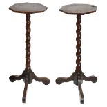 A pair of William and Mary burr walnut, oak and parquetry candlestands