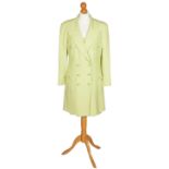 A lime green Chanel suit