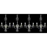 A set of four George III style cut glass twin light wall appliques