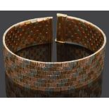 A three coloured 9ct gold textured brick link bracelet