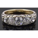 A Victorian five stone diamond set half hoop ring