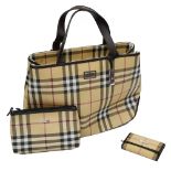 A Burberry handbag, make up bag and key wallet