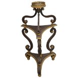 A late Regency gilt metal mounted, parcel-gilt, ebonised and simulated rosewood torchere