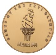 A bronze 1996 Atlanta Olympic Games participation medal