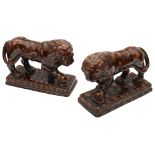 A pair of 19th century Staffordshire treacle glazed Medici lions