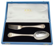 A George III silver shell and thread pattern table fork and spoon in fitted box