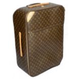 A Louis Vuitton monogrammed canvas 'Pegase Legere 65' suitcase