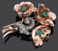 A Continental 1940's emerald and diamond floral dress clip