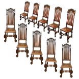 A set of ten William and Mary style oak high slat back dining chairs