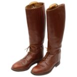 A pair of Vintage Burberry dark tan leather riding boots