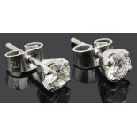 A pair of small single stone diamond set stud earrings