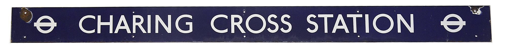 A London Transport enamel station sign for Charing Cross Station,with white lettering on a blue