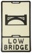 A cast iron low bridge sign