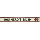 A London Underground enamel station frieze sign for Shepherd's Bush,black lettering on white