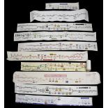 A group of paper and vinyl London Underground carriage line diagrams