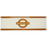 A London Underground enamel station frieze sign for 'BAKERLOO LINE',brown edging and roundel on