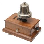 A railway signal box block bell made by R. E. Thompson