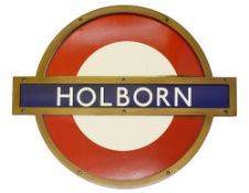 A London Underground Holborn enamel 'bullseye' roundel sign,in bronze frameheight 50cm, width 61.
