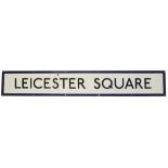 A London Underground enamel station frieze sign for Leicester Square,with black lettering on a white