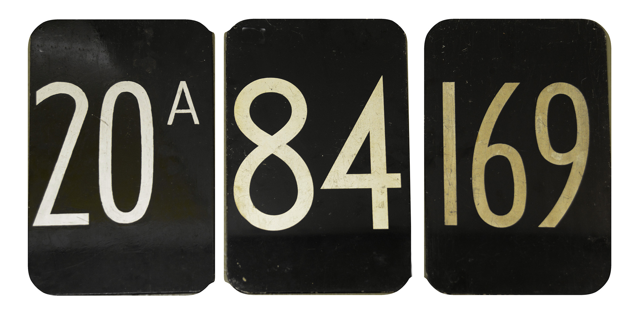 Three bus route number plates