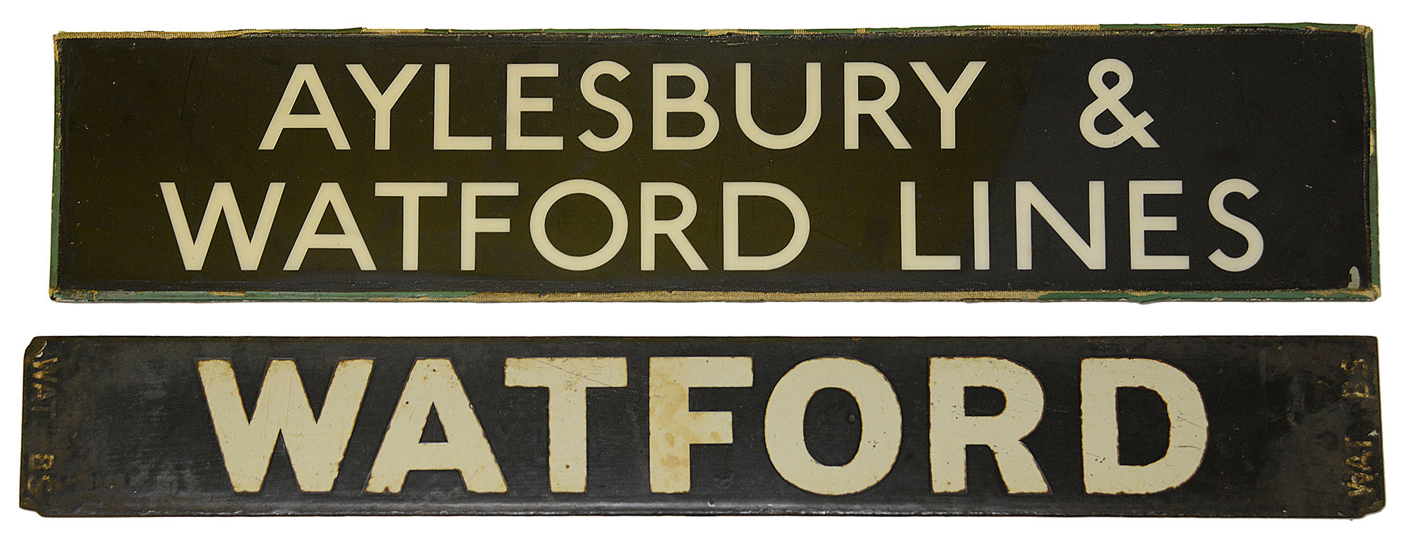 An LMS/LNWR enamel destination plate for WATFORD / BROAD STREET and a plastic sign